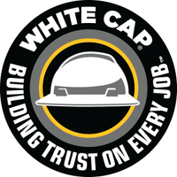 White Cap construction trust seal logo featuring a white hard hat on a gray and black circular background with yellow accents and the text 'WHITE CAP BUILDING TRUST ON EVERY JOB'.